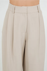 Soft Woven Pleated Trousers W Tapered Leg Opening